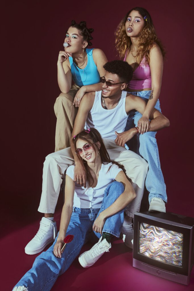 portrait-young-friends-2000s-fashion-style-posing-with-television-min (1)